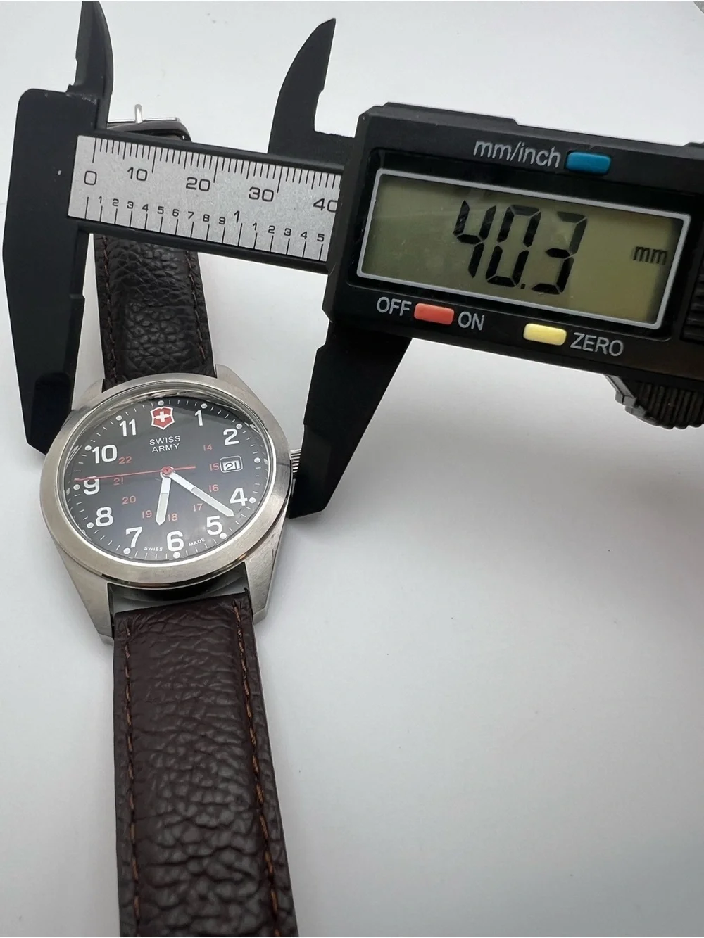 Victorinox Black Dial Watch with Brown Leather Strap and Red Accents